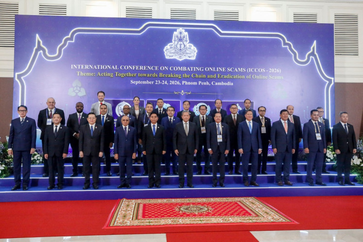 Cambodian Prime Minister Hun Manet (center) poses with representatives attending the International Conference on Combating Online Scams (ICCOS) in Phnom Penh on Sept. 3, 2026. Around 20 countries including the United States and China were represented at the meeting, held amid international pressure on Phnom Penh do more to tackle the multi-billion-dollar online scam industry.