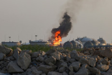 Flames burn at a facility belonging to Saudi oil giant Aramco south of Riyadh on October 3, 2026. The circumstances remained unclear but in recent weeks Aramco, majority-owned by the Saudi state, has come under attack from the Houthi authorities targeting the kingdom as part of the war in Yemen where Riyadh is backing the internationally recognized government. An AFP journalist reported seeing fire engines attempting to extinguish a blaze at the energy giant's Riyadh refinery, located south of the capital, while ambulances and police vehicles were stationed near the facility.