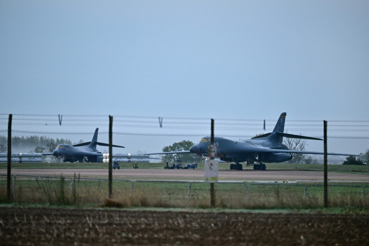 US Air Force bombers sit on the tarmac at RAF Fairford base in Fairford, south-west England on September 28, 2026, a day after British counter-terrorism police were probing &ldquo;a major&ldquo; incident near the base. Armed officers detained a group of five men in the early hours after a call to emergency services about three &ldquo;suspicious vehicles which appeared to be travelling towards the air base&ldquo;, London's Metropolitan Police said in a statement.
