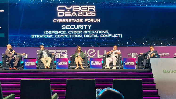 Navy Col. Bagus Jatmiko (second right), head of the War Gaming Center at the Indonesian Naval Staff and Command College (Seskoal), speaks on Tuesday during a session discussing security aspects in artificial intelligence and cyberspace in military operatons as part of the CyberDSA 2026 event in Kuala Lumpur. The event, running from Monday to Wednesday, also includes an exhibition for companies in AI and cyberspace.