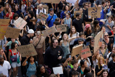 People take part in a demonstration part of a nationwide day of actions called by high-school students, joined by unions and teachers, who for days have been demanding better learning conditions in protests punctuated by violent confrontations in Paris on October 6, 2026. Students have blocked the entrances to hundreds of high schools for 15- to 17-year-olds since late September, complaining of missing teachers, overloaded timetables, dilapidated classrooms and buildings that cannot cope with rising temperatures.