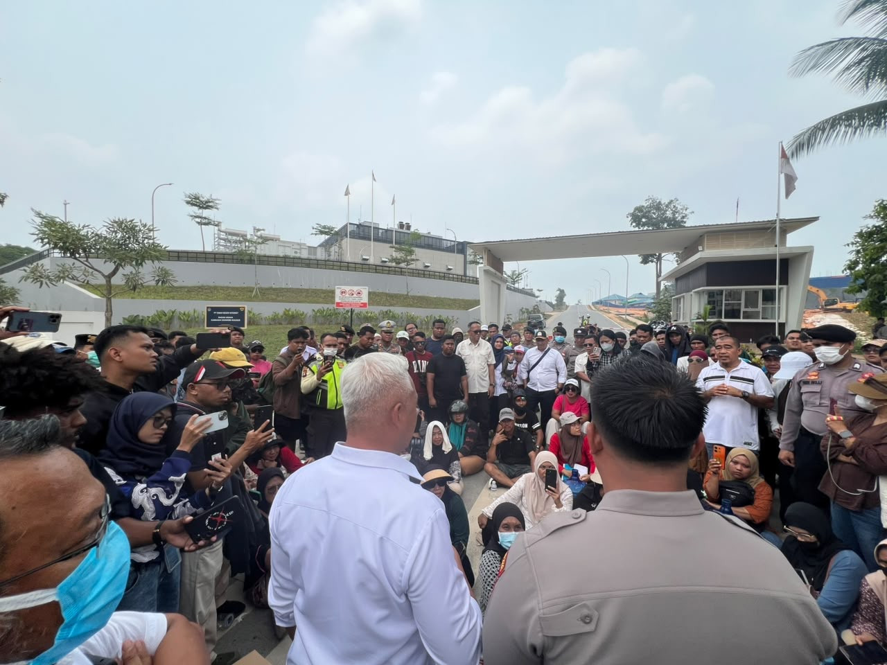 Residents of Nongsa district in Batam, Riau Islands, block access to Nongsa Digital Park during a protest on Oct. 5, 2026, over months of water shortages in their community, while water supplies to data centres in the park remain uninterrupted.


