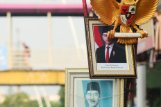 An image of Indonesian Vice President Gibran Rakabuming Raka is displayed in a frame outside a photo framing shop on Thursday in the Jatinegara area of East Jakarta.