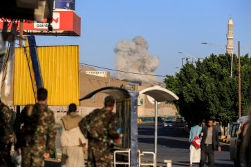 A plume of smoke rises during a reported airstrike by the Saudi-led coalition on the Houthi-controlled Yemeni capital Sanaa, on October 9, 2026. The Houthis, who are fighting the Saudi-backed, internationally recognized government, seized the coastline alongside a crucial trade route during a lightning offensive last month, extending their control over all of Yemen's Red Sea coast.