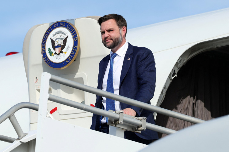 US Vice President JD Vance disembarks Air Force Two as he arrives at Cincinnati/Northern Kentucky International Airport, following a rally in Lima, Ohio, in Hebron, Kentucky, US, October 9, 2026. Vance traveled to Ohio to cast his early ballot and campaign for local Republican candidates ahead of the midterm elections.
