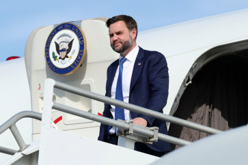 US Vice President JD Vance disembarks Air Force Two as he arrives at Cincinnati/Northern Kentucky International Airport, following a rally in Lima, Ohio, in Hebron, Kentucky, US, October 9, 2026. Vance traveled to Ohio to cast his early ballot and campaign for local Republican candidates ahead of the midterm elections.
