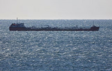 An oil tanker sails Nakhodka Bay on Dec. 4, 2022, near the Russian port city of Nakhodka.