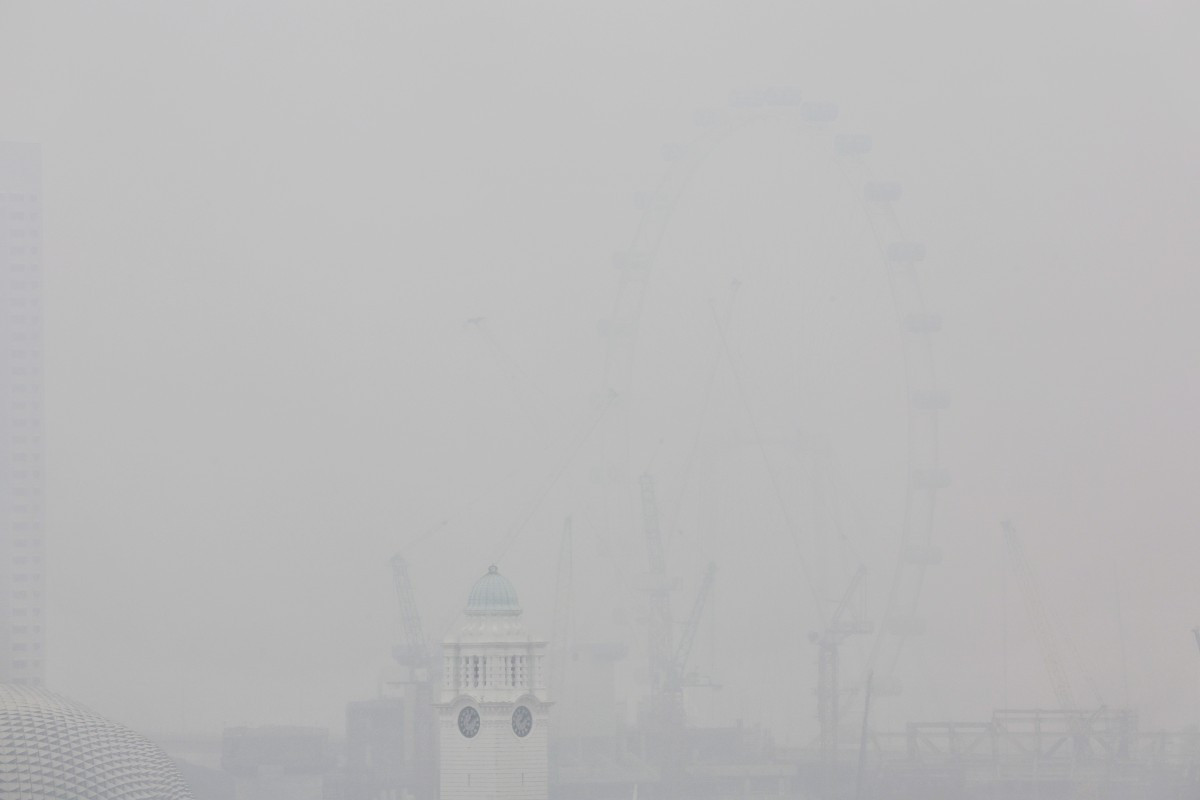 This picture provided by The Straits Times taken and received on October 14, 2026 shows the city shrouded with haze in Singapore. Air pollution in western Singapore hit the country's &ldquo;very high&ldquo; band on October 14, the environment agency said, as haze from Indonesia forest fires causes a regional crisis. 