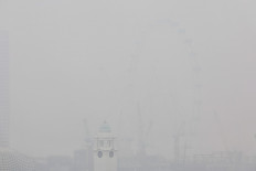 This picture provided by The Straits Times taken and received on October 14, 2026 shows the city shrouded with haze in Singapore. Air pollution in western Singapore hit the country's &ldquo;very high&ldquo; band on October 14, the environment agency said, as haze from Indonesia forest fires causes a regional crisis. 