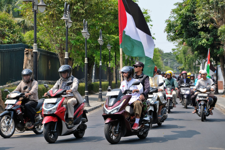 Demonstrators ride in a convoy on Oct. 13, 2026, to the Borobudur Temple Tourism Park office to protest Italian tenor Andrea Bocelli&rsquo;s planned concert in Magelang, Central Java. Members of various community groups gathered at the complex to oppose the concerts, scheduled for Borobudur Temple on Oct. 31 and Jakarta on Nov. 3, citing the singer&rsquo;s perceived links to Israel. 