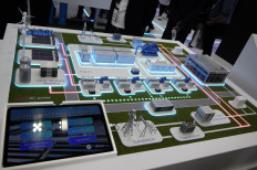 Computing infrastructure: A scale model of Delta&rsquo;s data center microgrid solution, integrating energy storage, renewable energy and backup power systems, is displayed during the 12th edition of Tech Week Singapore, which ran from Sept. 29 to 30 at Marina Bay Sands Expo & Convention.