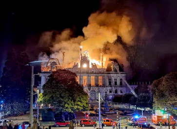 This photograph shows a fire burning and destroying the city hall after a group of individuals forced entry into the building during ongoing protest action against the &ldquo;high cost of living&ldquo;, in Limoges, central France on October 17, 2026 as part of a nationwide call for mobilization bringing together various groups expressing their anger: former &ldquo;Yellow Vest&ldquo;, secondary school and university students, climate activists and even farmers.