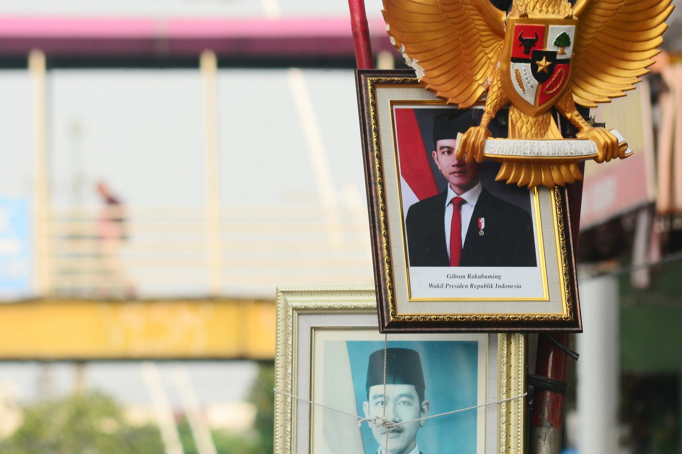 An image of Indonesian Vice President Gibran Rakabuming Raka is displayed in a frame outside a photo framing shop on Thursday in the Jatinegara area of East Jakarta