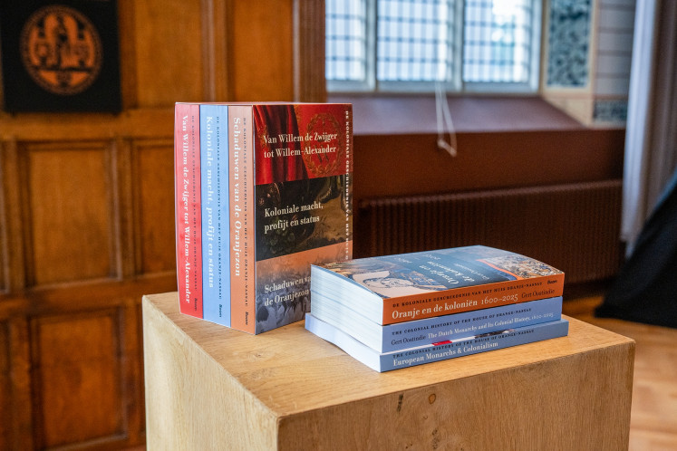 Colonial reckoning: Five books from a research project examining the House of Orange-Nassau&rsquo;s role in colonialism, alongside a summary for general readers, 'Oranje en de Koloni&euml;n', '1600-2025: De koloniale geschiedenis van het Huis Oranje-Nassau' (Orange and the Colonies, 1600-2025: The Colonial History of the House of Orange-Nassau), are displayed at Leiden University in the Netherlands in this undated photo.