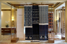 Indigo heritage: Handwoven textiles from Hambapraing, Kanatang, are displayed on Sept. 3, 2026, in the foyer of The Dharmawangsa Jakarta&rsquo;s grand ballroom in South Jakarta. The East Sumba area is known for its indigo-dyed fabrics and motifs inspired by local flora and fauna, and remains an important center of Sumba&rsquo;s weaving tradition.