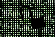 An illustration picture taken on October 21, 2026 shows a padlock in front of binary code on a laptop screen in Frankfurt am Main, western Germany. Government agencies and companies around the world shut down websites on October 21, 2026 after two critical flaws came to light involving PHP, a programming language that is the basis for a large share of the internet. 