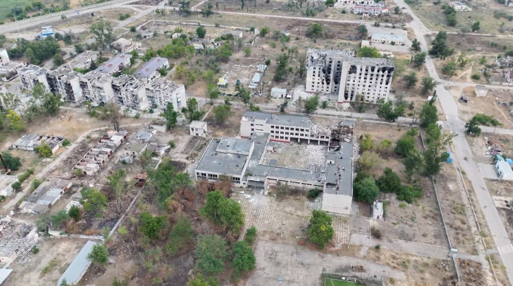 A still image taken from an undated drone video released Sept. 12, 2026, shows a destroyed buildings in Oleshky, Kherson Region, Russian-controlled Ukraine. 
