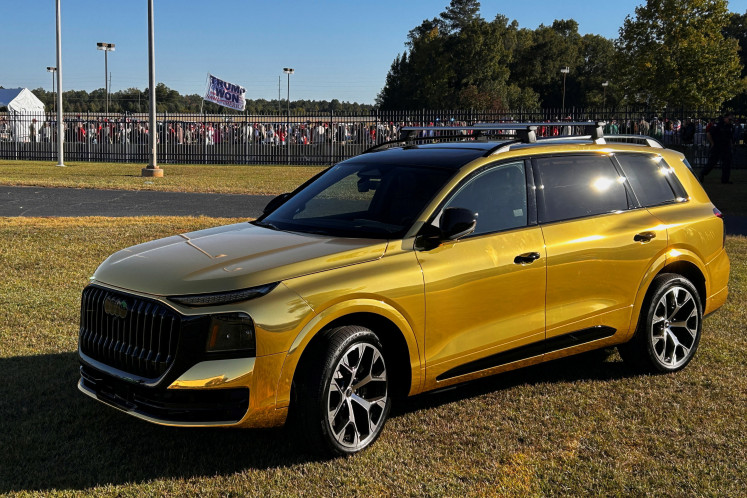 An&nbsp;Audi&nbsp;Q9 SUV is displayed outside the venue of US President Donald Trump's political rally before his arrival in Perry, Georgia, on Oct. 24, 2026.