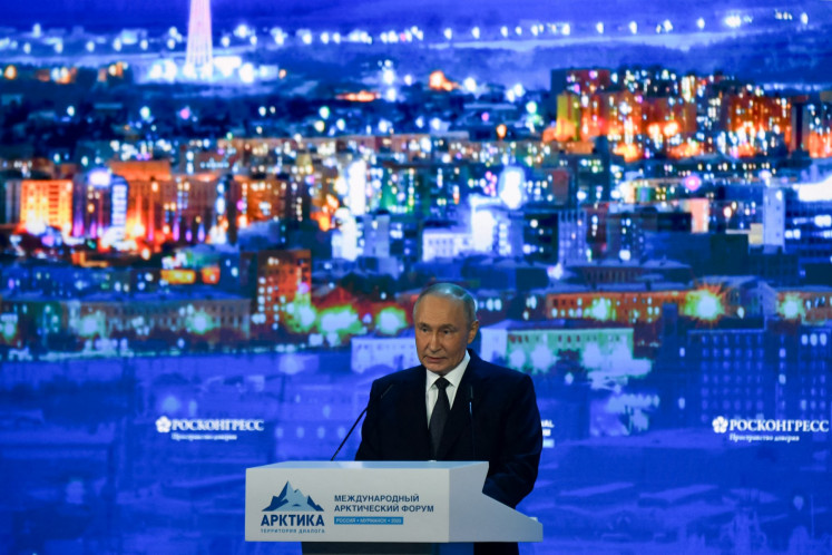Russian President Vladimir Putin gives a speech at the International Arctic Forum in Murmansk, Russia, on March 27, 2025.