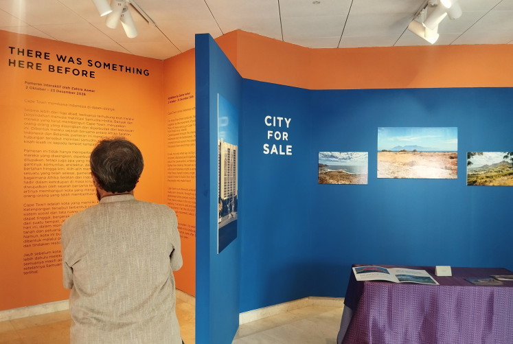 Fragments of belonging: A visitor views There Was Something Here Before, an exhibition documenting Cape Town&rsquo;s history through photographs, archival materials and artworks, on Oct. 8, 2026, at Erasmus Huis in South Jakarta.
