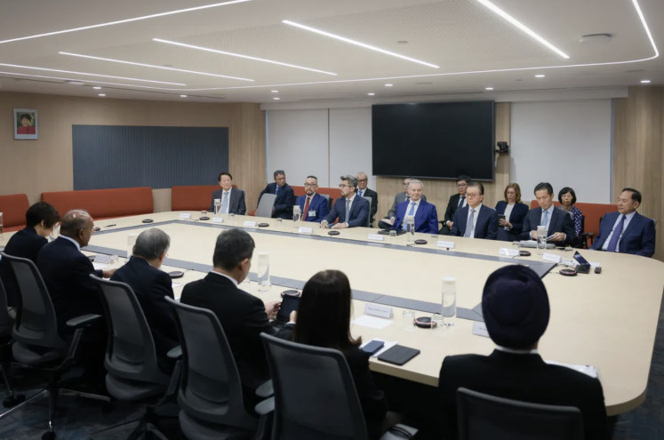 Senior leaders representing the 10 Singapore firms being investigated for their links to haze-causing fires at a meeting on Oct. 28.