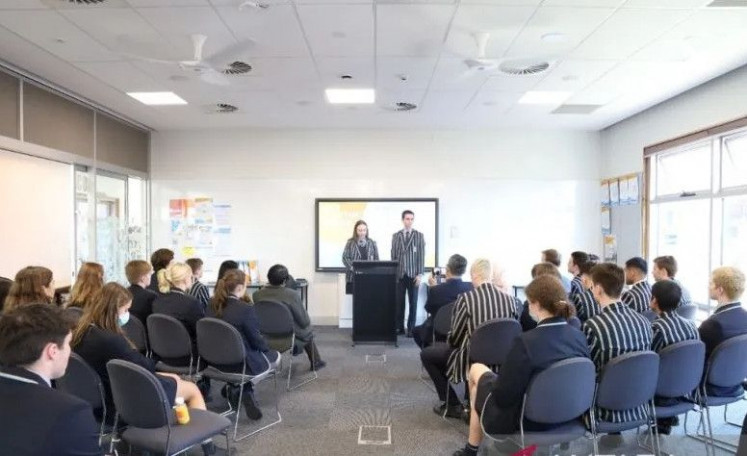Apa kabar? Canberra Grammar School (CGS) students join an Indonesian language class attended by Indonesian Ambassador to Australia Siswo Pramono (center right) on May 17, 2022, in Canberra.