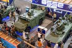 Line of defense: Visitors examine armored fighting vehicles produced by Indonesian defense solutions companies Sentra Surya Ekajaya and IPCD Group during the Indo Defense Expo and Forum military equipment exhibition at Jakarta International Expo in Jakarta on June 12, 2025.